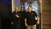Ludacris and the guys hangout in front of the tank!