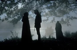 Marian Dubois (Mary Elizabeth Mastrantonio) and  Robin Hood (Kevin Costner).