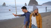 Contributors Jacob Rose (L) and Ciji Dieringer (R) are all smiles as they enjoy one of Oregon's beautiful beaches as seen on HGTV's Beachfront Bargain Hunt.