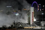 A portion of the Clarion Hotel and Casino is left standing after the property was imploded in Las Vegas, Nevada.