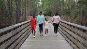 Contributors Keisha Echols (R) and Echo Robinson (CL) enjoy a hike in Alabama's beautiful Gulf State Park, with Keisha's children Pria Echols (CR) and Preston Echols (L) as seen on HGTV's Beachfront Bargain Hunt. Contributors Keisha Echols (R) and Echo Robinson (CL) enjoy a hike in Alabama's beautiful Gulf State Park, with Keisha's children Pria Echols (CR) and Preston Echols (L) as seen on HGTV's Beachfront Bargain Hunt.