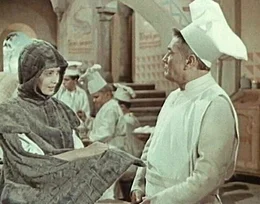 Prinzessin Lada (Marie Kyselkov&aacute;) in Verkleidung im Gespr&auml;ch mit einem Koch.