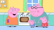 Mama Wutz (li.) backt heute einen Apfelkuchen. Während Familie Wutz wartet, bis er fertig ist, spielen Papa Wutz (hi.re.), Peppa (vo.re.) und Schorsch (mi.) ein Suchspiel.