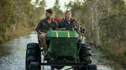 Phil T. and Heather A. ride swamp buggy through shallow sawgrass marsh. Phil T. and Heather A. ride swamp buggy through shallow sawgrass marsh.