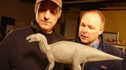 TORONTO, CANADA: Dr. Phillip Lars Manning and Hall Train examine a miniature clay model of a Hadrosaur. Train makes dinosaur models here in his studio. TORONTO, CANADA: Dr. Phillip Lars Manning and Hall Train examine a miniature clay model of a Hadrosaur. Train makes dinosaur models here in his studio.
