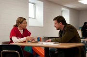 Elizabeth Banks (Lara Brennan), Russell Crowe (John Brennan).