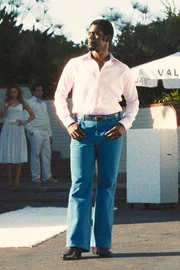 Quincy Isaiah as Magic Johnson