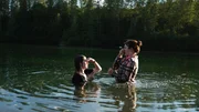 Bird Brown and Rain Brown have returned to Alaska and have fun swimming in a lake they used to swim in as young children. Bird Brown and Rain Brown have returned to Alaska and have fun swimming in a lake they used to swim in as young children.