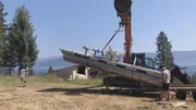 A Montana carpenter builds a pontoon houseboat on Flathead Lake.