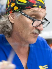 Huskies are brought in by Theresa from National Dog Mill to get spayed and neutered for adoption.