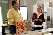 Cameron Tucker (Eric Stonestreet), Claire Dunphy (Julie Bowen).