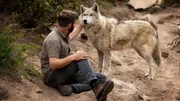 Forrest Galante with a wolf.