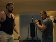 L-R: Paulie (Olivier Richters), Jack Reacher (Alan Ritchson)