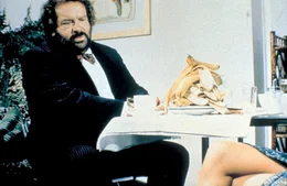 In v&ouml;lliger Unkenntnis der modernen Lebensweise ger&auml;t Hinterw&auml;ldler Joe (Bud Spencer) auf der Jagd nach einer Lizenz f&uuml;r seinen Bananenverkauf von einer Katastrophe in die n&auml;chste ...