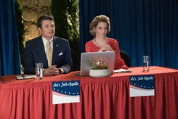 L-R: John (John Michael Higgins), Gail (Elizabeth Banks)