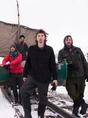 Parker Schnabel, Rick Ness, Karla Charlton & James Levelle are with their canoe.