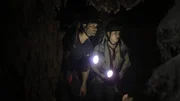 Heather A. and Phil T. begin their investigation inside the cave.