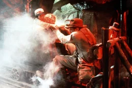 Ke Huy Quan (Short Round), Kate Capshaw (Willie Scott), Harrison Ford (Indiana Jones).