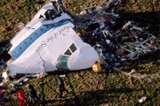 The cockpit section of 'Clipper Maid of the Seas, Pan Am flight 103' is inspected by police and specialists following its mid-air bombing over the village of Lockerbie, Dumfries and Galloway, United Kingdom.