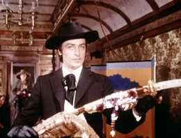 Alain Delon als Gauche