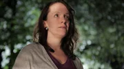 Lori looks into the distance. Lori looks into the distance.