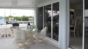 Must Sea has a perfect deck for family dinners and entertaining friends, as seen on HGTV's Beachfront Bargain Hunt.
