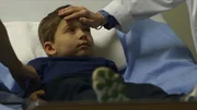 A boy on examination at the doctor.