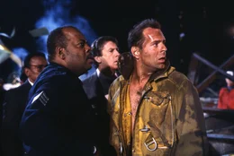 Reginald Veljohnson (Sgt. Al Powell), Bruce Willis (John McClane).
