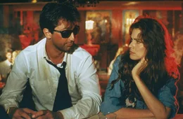 L-R: Victor (Thierry Lhermitte) und Veronica Flame (Carol Alt)