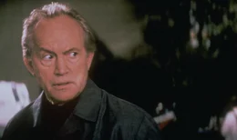 John Milton (Lance Henriksen)