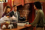 Brennan (Emily Deschanel, L) and Booth (David Boreanaz, C) interview an herbalist (guest star Jack Yang, R) in 'The Body in the Bag' episode of BONES.