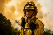 Firefighter Tony Robinson gazes at the destruction of the Carmel Fire in Carmel, California.