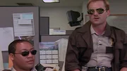 L-R: Deputy S. Jones (Cedric Yarbrough), Lieutenant Jim Dangle (Thomas Lennon)