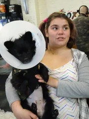 Alexander Dismore brought his cat Princess Utah in because she had a broken leg.