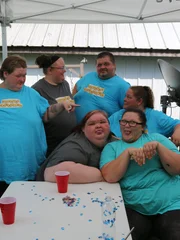 The family enjoys a backyard barbecue.