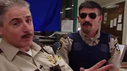 L-R: Deputy James Garcia (Carlos Alazraqui), Deputy Travis Junior (Robert Ben Garant) L-R: Deputy James Garcia (Carlos Alazraqui), Deputy Travis Junior (Robert Ben Garant)