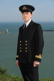 LT. Colin Race (Tom Burke).