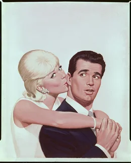 W&auml;hrend seine Frau Beverly (Doris Day, l.) &uuml;ber Nacht ber&uuml;hmt wird, versucht Dr. Gerald Boyer (James Garner, r.), sie wieder an das Haus und den Herd zu binden ...