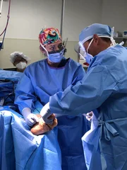 Dr. Brad and Dr. Sarah discussing in surgery