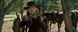 L - R: Rosalee Quaid (Rosamund Pike), Tanaya Beatty (Living Woman)