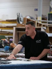 Wayde painting the corals.