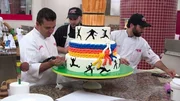 Buddy, Chad, and Ralph work hard to perfect the Capoiera cake. Buddy, Chad, and Ralph work hard to perfect the Capoiera cake.