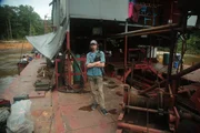 Parker Schnabel looking at camera, while stood on dredge. Parker Schnabel looking at camera, while stood on dredge.