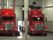 Two Peterbilt Model 387's on display. Two Peterbilt Model 387's on display.