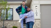 CLOSE UP OF HOST DAVID BROMSTAD (LEFT) POSING FOR A PICTURE WITH LOTTERY WINNER CODY PETERSON (RIGHT) OUTSIDE OF HOUSE 3, PLUM CREEK, HERO HOUSE