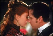 On left: Satine (Nicole Kidman)
