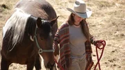 As a trust building exercise, Bird Brown learns to halter and lead her horse.