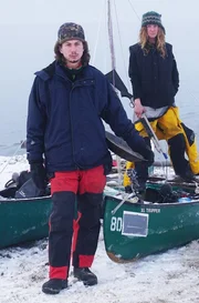 Parker Schnabel, Rick Ness, Karla Charlton & James Levelle stand with their canoe.