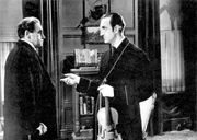 Basil Rathbone as Sherlock Holmes(r.)