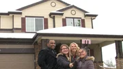 The family takes a selfie in front of their new house The family takes a selfie in front of their new house